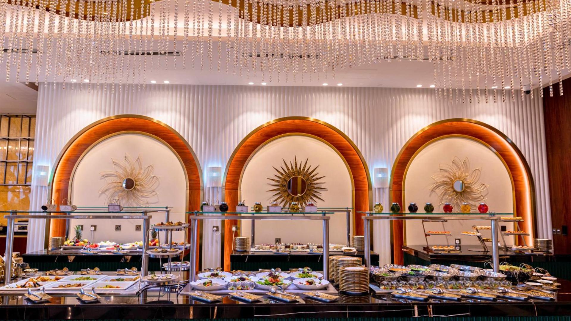 Velero Hotel Doha Lusail Exterior photo The buffet at the Grand Ballroom